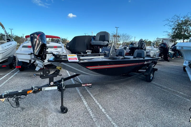 The Image of 2024 Tracker Bass Tracker Classic XL boat on trailer in parking lot. - 0