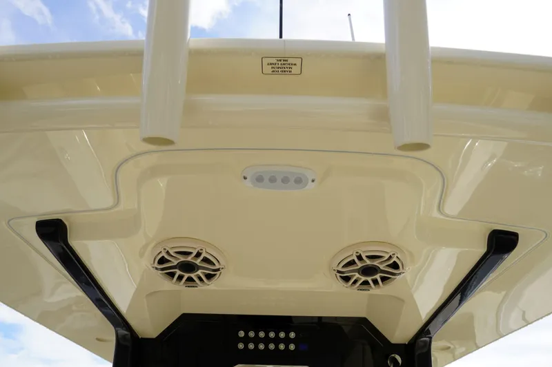 Slide: The Image of 2026 Scout 288 LXF boat ceiling with speakers and lighting fixtures. - 18