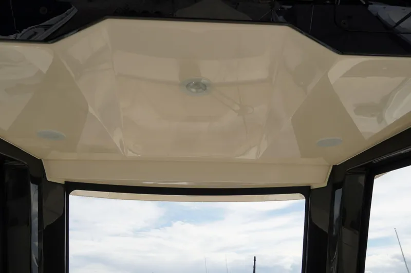 Slide: The Image of Ceiling view of 2026 Scout 288 LXF boat, featuring sleek design and integrated lighting. - 26