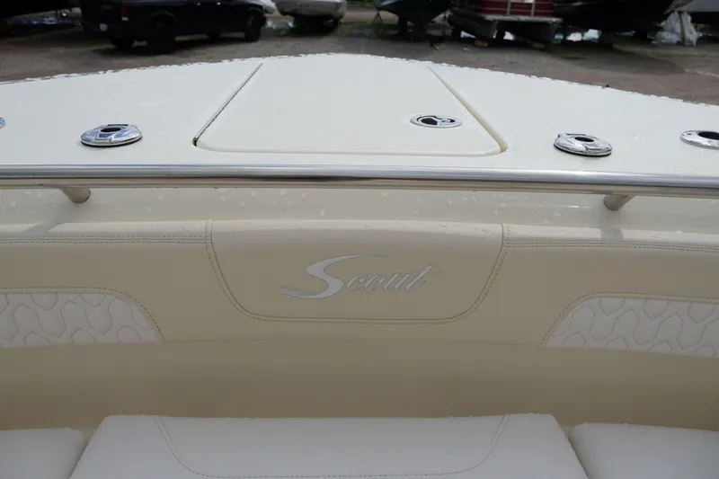 Slide: The Image of 2026 Scout 288 LXF boat interior with logo and sleek design details. - 37