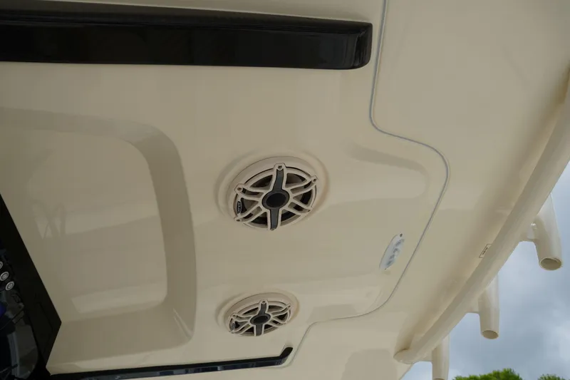 Slide: The Image of 2026 Scout 288 LXF boat speakers and ceiling detail, showcasing modern marine design. - 54