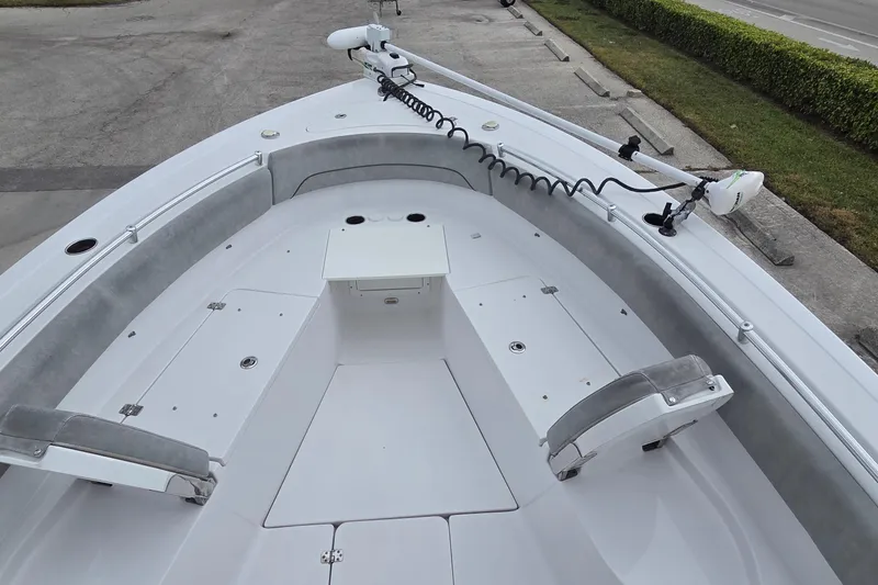 Slide: The Image of 2020 Sportsman Open 282 Center Console boat with spacious deck and seating. - 13