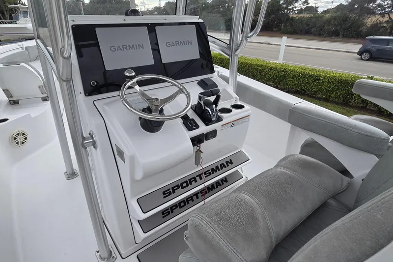 Slide: The Image of 2020 Sportsman Open 282 Center Console with dual Garmin displays and steering wheel. - 14