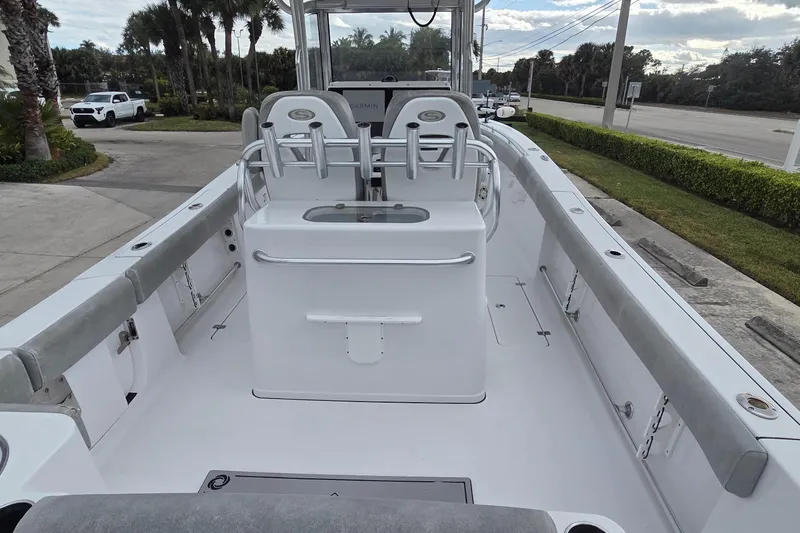 Slide: The Image of 2020 Sportsman Open 282 Center Console boat interior with seating and console. - 20