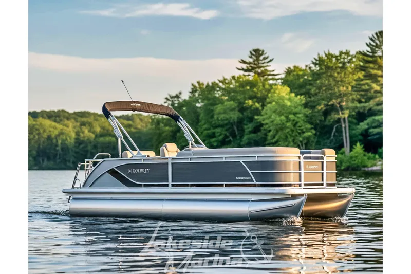 The Image of 2026 Godfrey Sweetwater 2286 SFLC pontoon boat on a serene lake. - 1