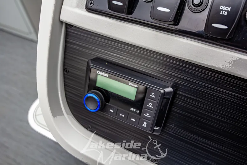 Slide: The Image of Control panel of 2026 Godfrey Sweetwater 2286 SFLC with Clarion audio system. - 12