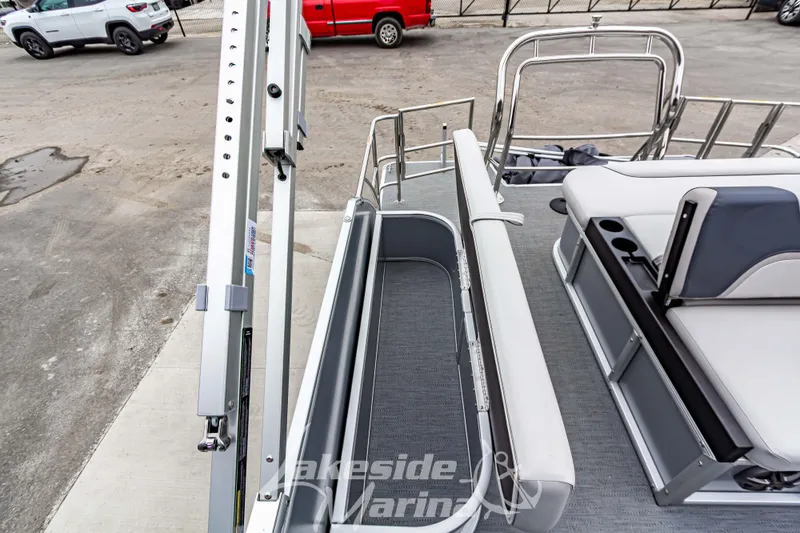 Slide: The Image of 2026 Godfrey Sweetwater 2286 SFLC pontoon boat interior with seating and storage compartments. - 17