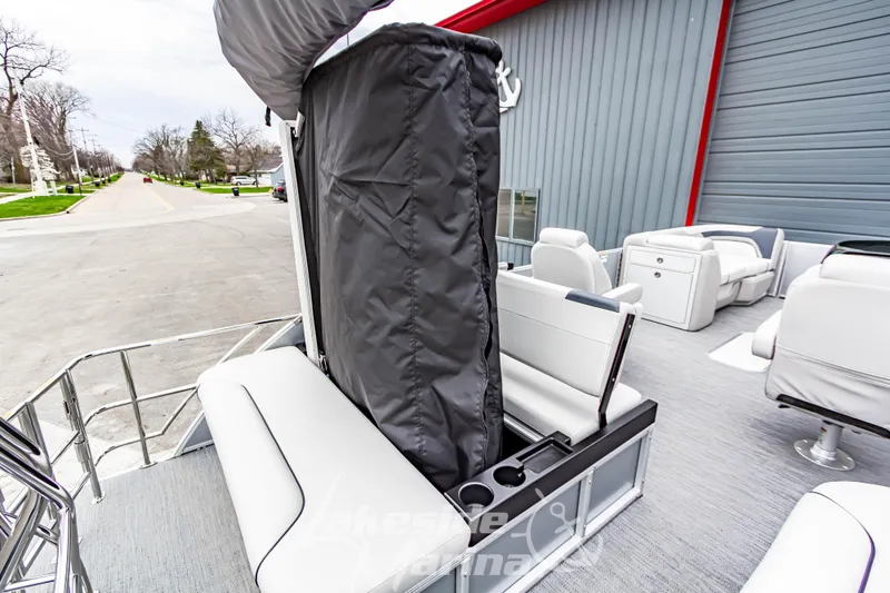 Slide: The Image of 2026 Godfrey Sweetwater 2286 SFLC pontoon boat interior with seating and storage. - 21