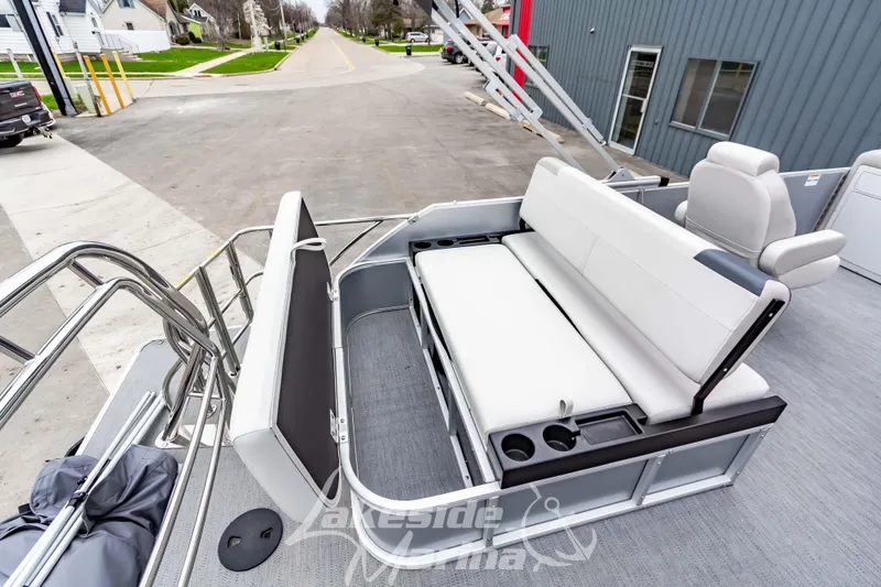 Slide: The Image of 2026 Godfrey Sweetwater 2286 SFLC pontoon boat with spacious seating and modern design. - 22