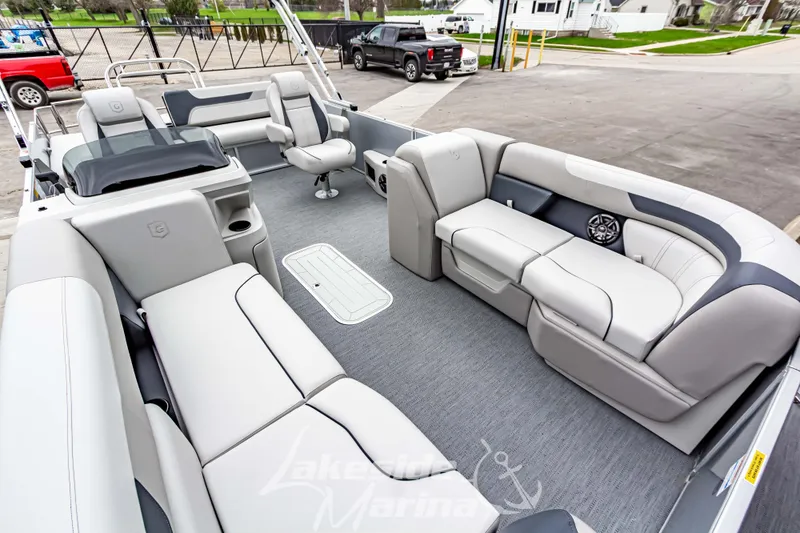 Slide: The Image of 2026 Godfrey Sweetwater 2286 SFLC pontoon boat with spacious seating and modern design. - 4