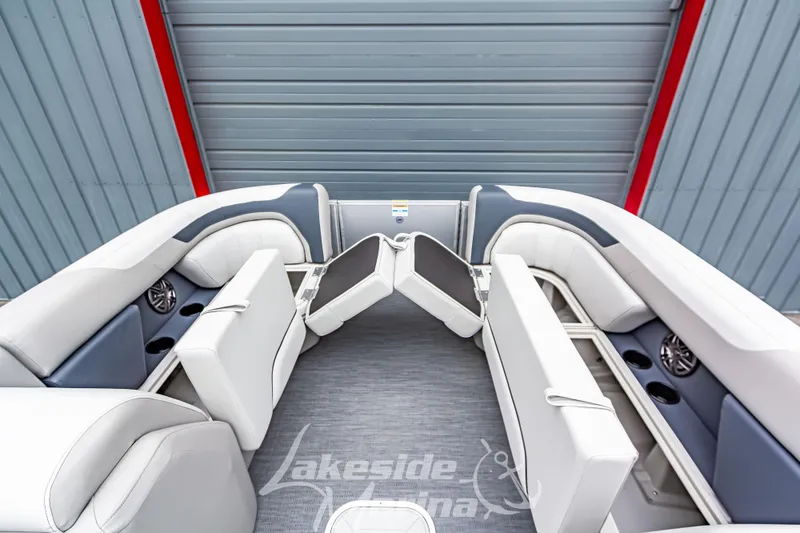 Slide: The Image of Interior of 2026 Godfrey Sweetwater 2286 SFLC pontoon boat with plush seating. - 6