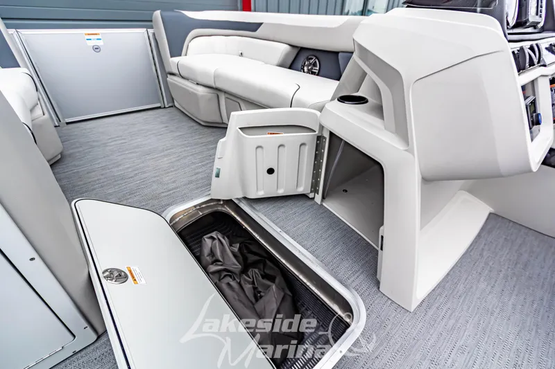 Slide: The Image of 2026 Godfrey Sweetwater 2286 SFLC boat interior with open storage compartments. - 9
