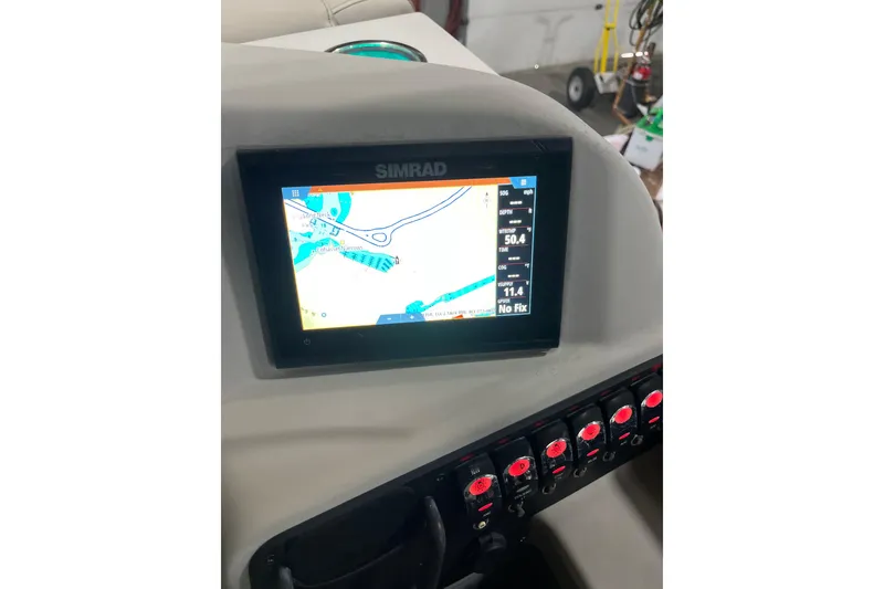 Slide: The Image of Simrad navigation display on 2021 Barletta Cabrio 20UC boat dashboard. - 10