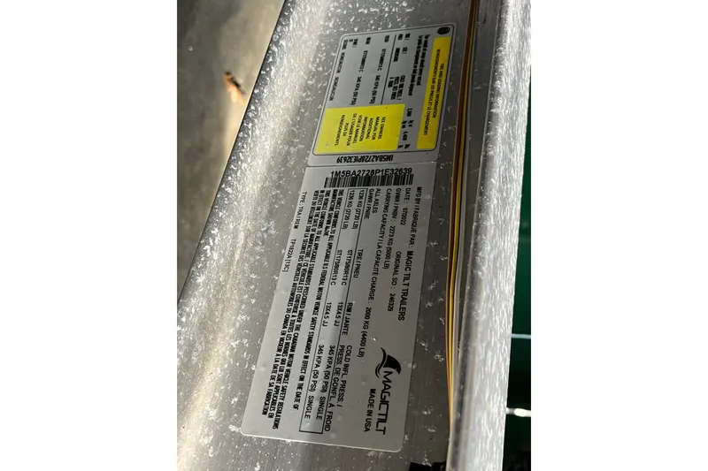 Slide: The Image of Label on a 2021 Barletta Cabrio 20UC boat trailer, showing specifications and manufacturer details. - 21