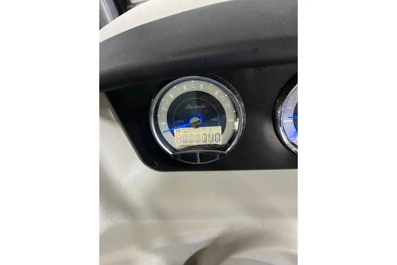 Slide: The Image of Dashboard of 2021 Barletta Cabrio 20UC showing RPM gauge. - 9
