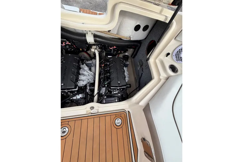 Slide: The Image of 2014 Yamaha Boats 242 Limited engine compartment with dual high-output engines. - 19
