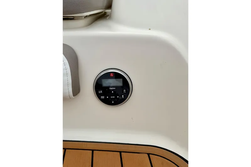 Slide: The Image of Control panel on 2014 Yamaha Boats 242 Limited, featuring Clarion audio system. - 25