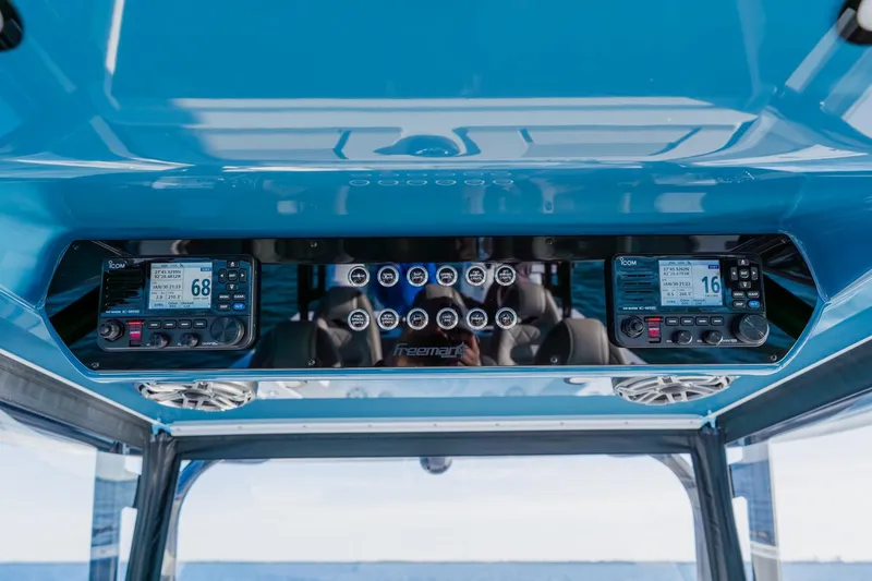 Slide: The Image of Freeman 42LR 2025 boat dashboard with advanced navigation controls and displays. - 33