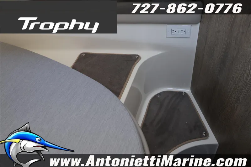 Slide: The Image of Interior of 2026 Bayliner Trophy T29 Explorer boat with seating and steps. - 17
