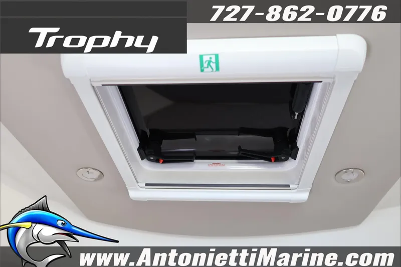 Slide: The Image of 2026 Bayliner Trophy T29 Explorer hatch detail, Antonietti Marine contact info. - 19