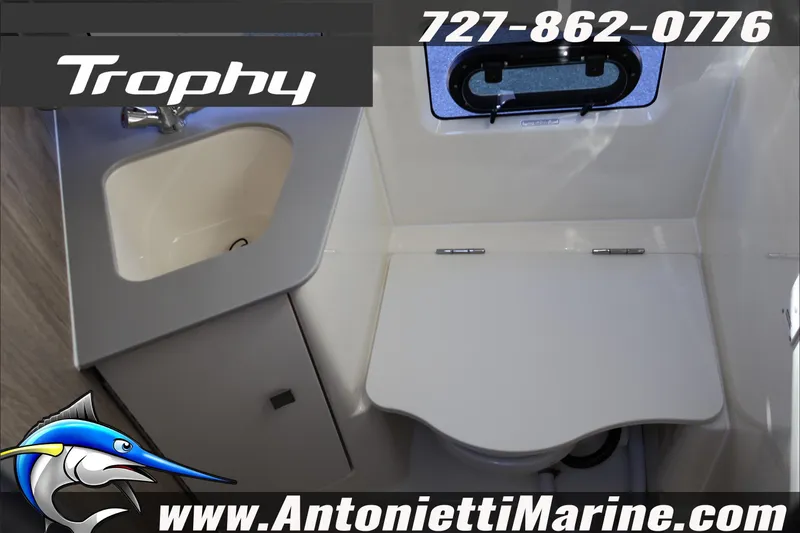 Slide: The Image of Interior of 2026 Bayliner Trophy T29 Explorer boat bathroom with sink and toilet. - 20