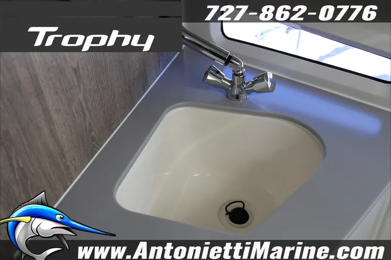 Slide: The Image of 2026 Bayliner Trophy T29 Explorer sink with faucet, showcased by Antonietti Marine. - 21