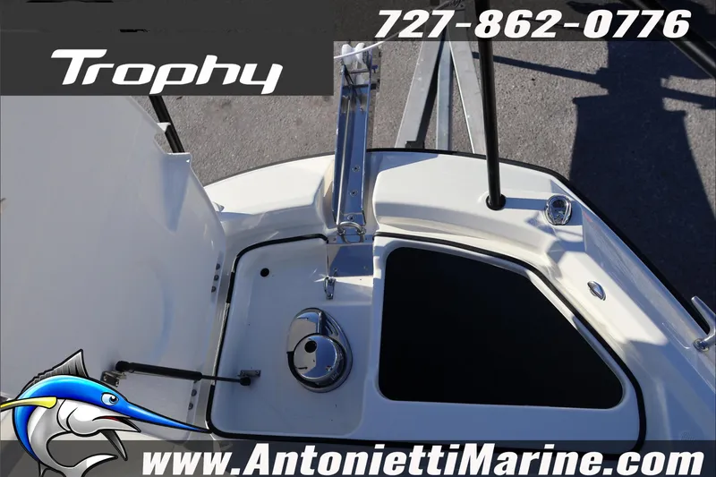 Slide: The Image of 2026 Bayliner Trophy T29 Explorer boat deck with contact details and logo. - 33