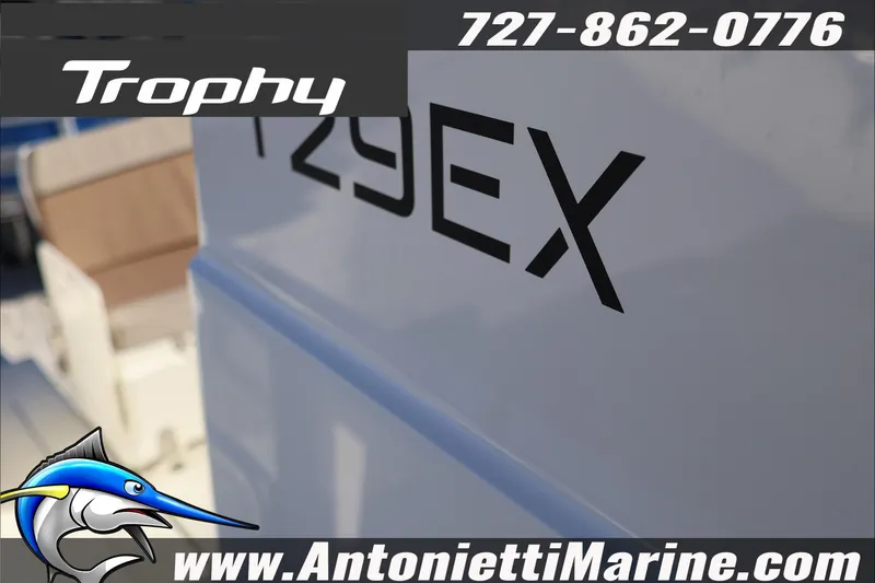 Slide: The Image of Bayliner Trophy T29 Explorer 2026 boat detail with contact info and logo. - 36