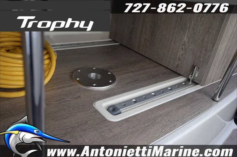 Slide: The Image of 2026 Bayliner Trophy T29 Explorer deck with storage and yellow hose, Antonietti Marine branding. - 38