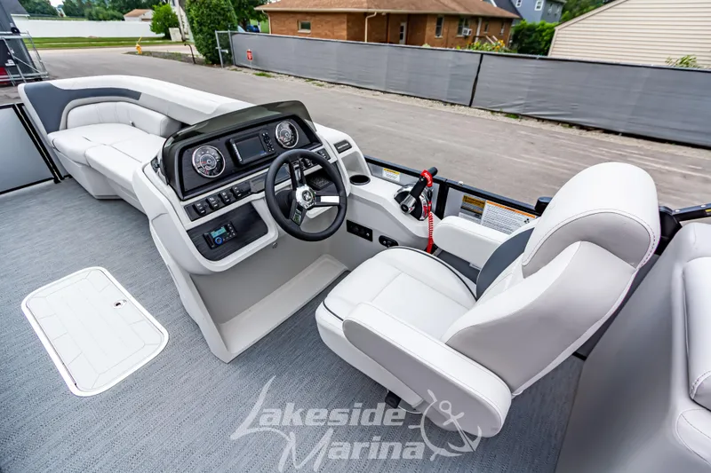 Slide: The Image of Interior view of 2026 Godfrey Sweetwater 2286 SBC boat with modern helm and seating. - 12