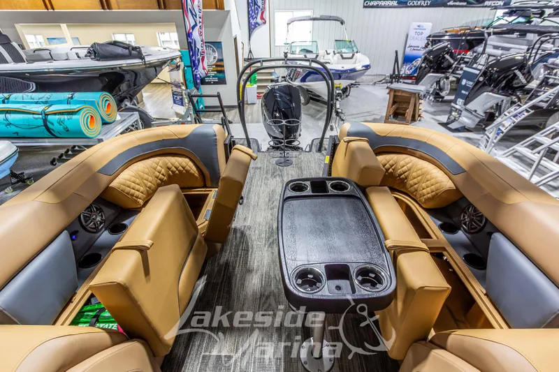 Slide: The Image of Interior of 2026 Godfrey Sweetwater 2286 SBC pontoon boat with luxurious seating and table. - 25