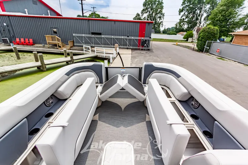 Slide: The Image of 2026 Godfrey Sweetwater 2286 SBC pontoon boat interior with spacious seating and modern design. - 5