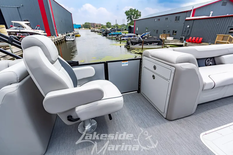Slide: The Image of 2026 Godfrey Sweetwater 2286 SBC pontoon boat interior at Lakeside Marina. - 9