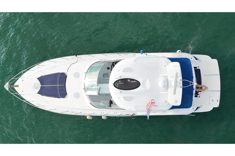 Slide: The Image of Aerial view of a 2005 Cruisers Yachts 500 Express on the water. - 2