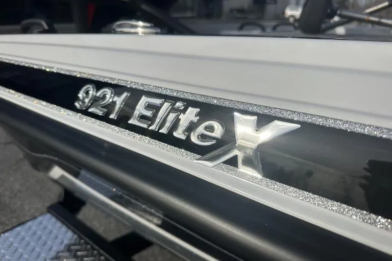 Slide: The Image of Close-up of 2026 Phoenix 921 Elite X boat model nameplate. - 2