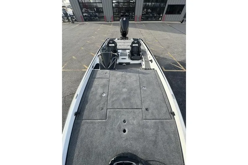 Slide: The Image of 2026 Phoenix 921 Elite X boat with spacious deck and dual seats. - 3