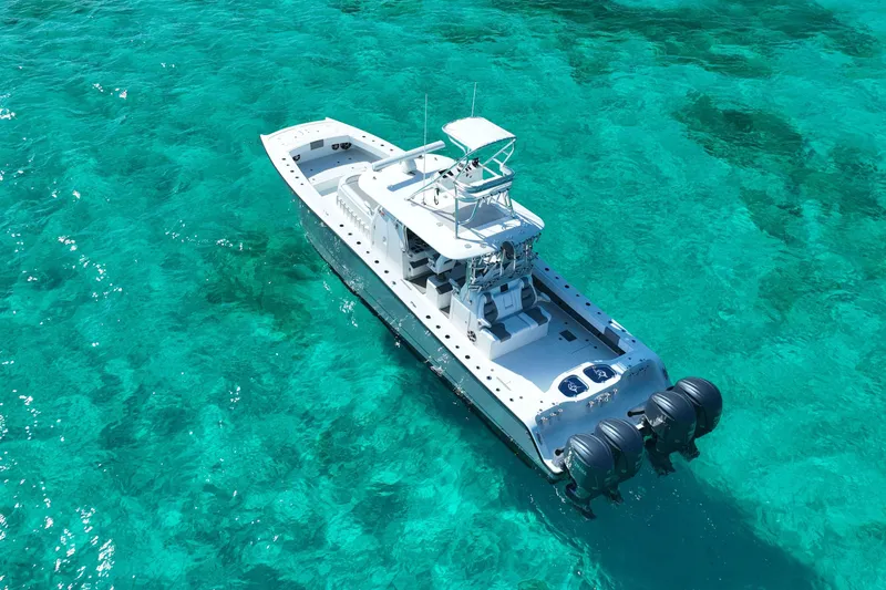 Slide: The Image of Aerial view of 2024 Freeman 42 boat on clear turquoise water. - 15