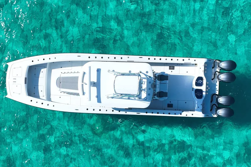 Slide: The Image of Aerial view of 2024 Freeman 42 boat on clear turquoise water. - 7