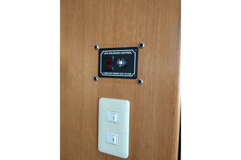 Slide: The Image of LPG solenoid control panel on 1997 Symbol 50 Pilothouse yacht interior. - 24