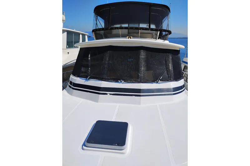 Slide: The Image of 1997 Symbol 50 Pilothouse yacht with sleek design and spacious deck. - 8