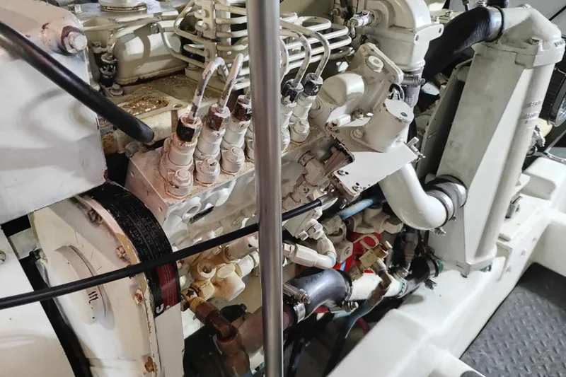 Slide: The Image of Engine components of a 1997 Symbol 50 Pilothouse boat, showcasing intricate mechanical details. - 90