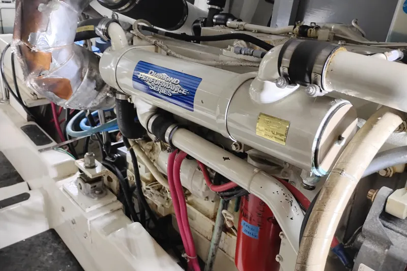 Slide: The Image of Engine compartment of a 1997 Symbol 50 Pilothouse, featuring Diamond Performance Series components. - 92