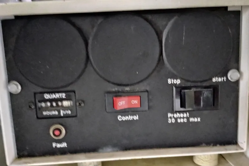 Slide: The Image of Control panel of a 1997 Symbol 50 Pilothouse with switches and indicators. - 99