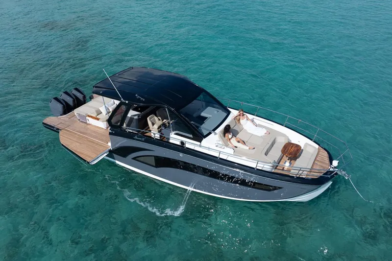 Slide: The Image of Luxurious 2026 Hanover 447 yacht cruising on clear turquoise waters. - 17