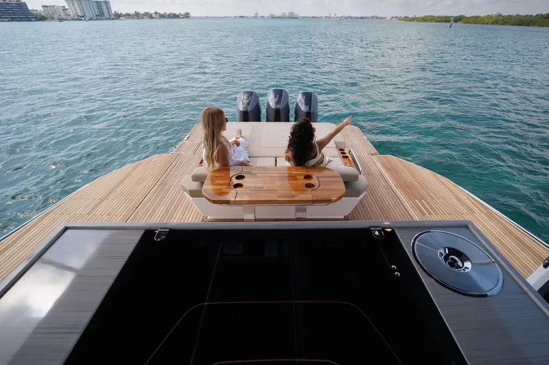 Slide: The Image of Two people relaxing on a Hanover 447 yacht, 2026 model, enjoying the ocean view. - 31