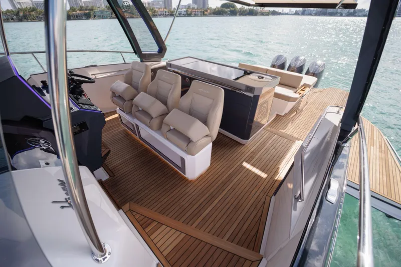 Slide: The Image of Luxurious 2026 Hanover 447 yacht interior with plush seating and sleek design on open water. - 42