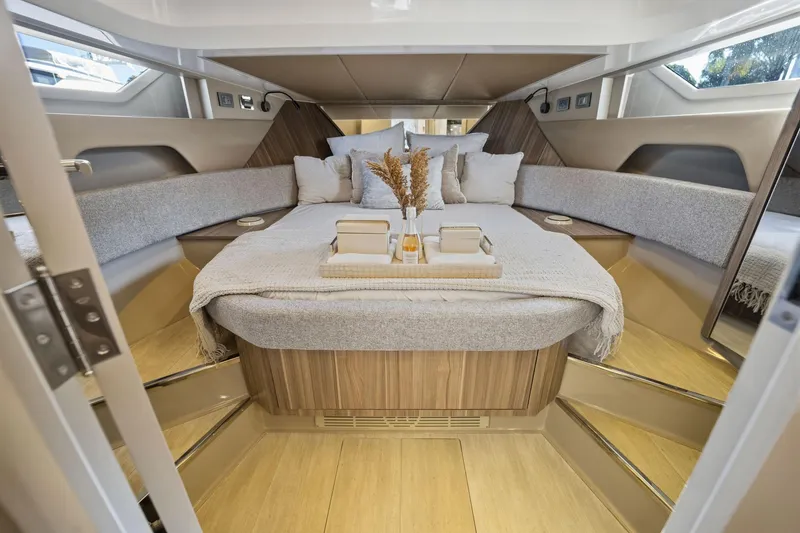 Slide: The Image of Luxurious interior of 2026 Hanover 447 yacht with elegant bedding and modern design. - 52