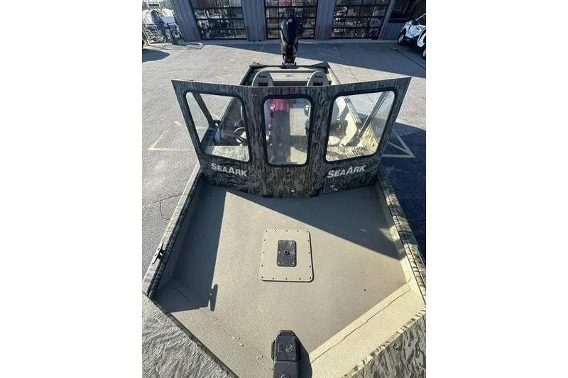 Slide: The Image of 2026 SeaArk 2272 MV boat with camo design and spacious deck. - 5