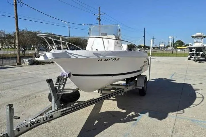 Slide: The Image of 2001 Pro-Line 19 Sport boat on trailer in outdoor setting. - 3