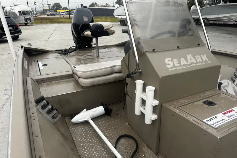 Slide: The Image of 2007 SeaArk Coastal 200 CC boat interior with steering console and seating. - 12